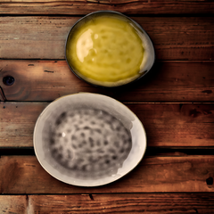 Handmade artistic and glazed oval "Gilded Sunburst" plate - Crafty-Clayworks